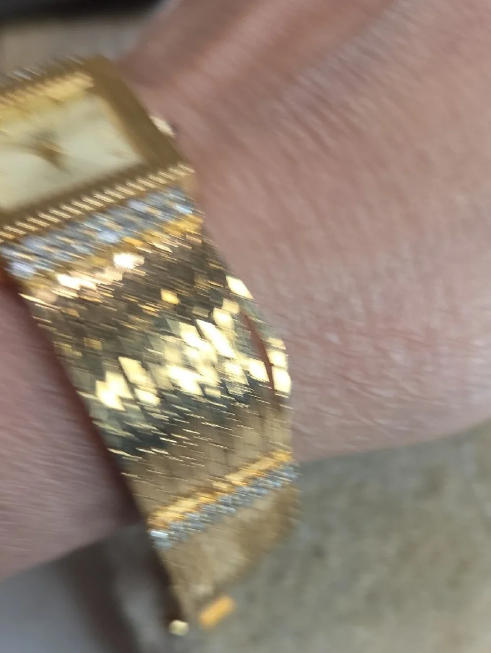 Nolan Miller Gold Chain Bracelet Watch  Rhinestone Accents Blue Sapphire Crown